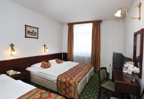 Imagen de la habitación del Hotel Palatinus Grand. Foto 7