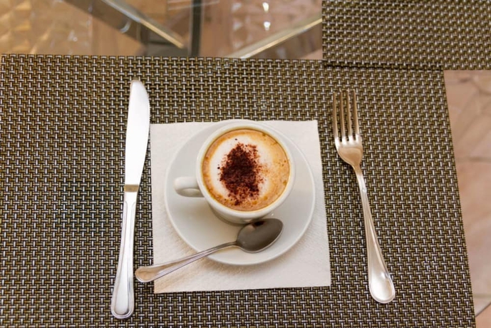 Imagen del bar/restaurante del Hotel Palau City. Foto 5