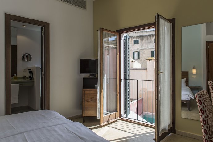 Imagen de la habitación del Hotel Palau Sa Font. Foto 8