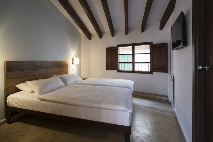 Imagen de la habitación del Hotel Palau Sa Font. Foto 11