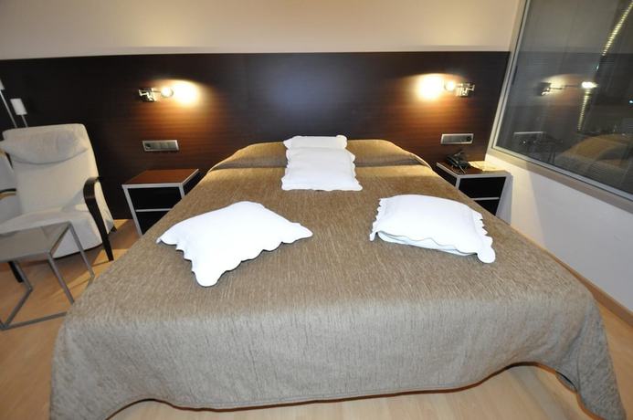 Imagen de la habitación del Hotel Palau de girona. Foto 12