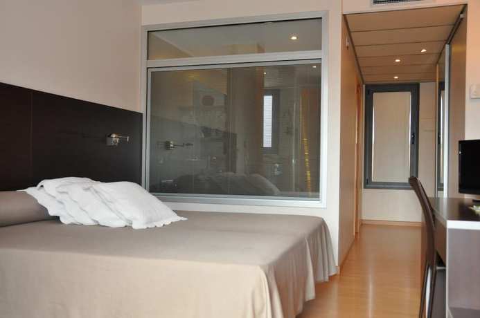 Imagen de la habitación del Hotel Palau de girona. Foto 16