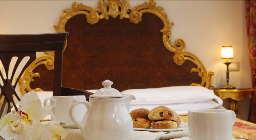 Imagen de la habitación del Hotel Palazzina Fortuny. Foto 4