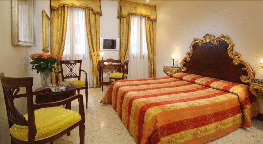 Imagen de la habitación del Hotel Palazzina Fortuny. Foto 5