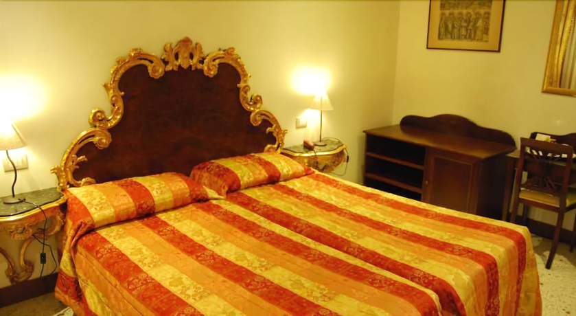 Imagen de la habitación del Hotel Palazzina Fortuny. Foto 6