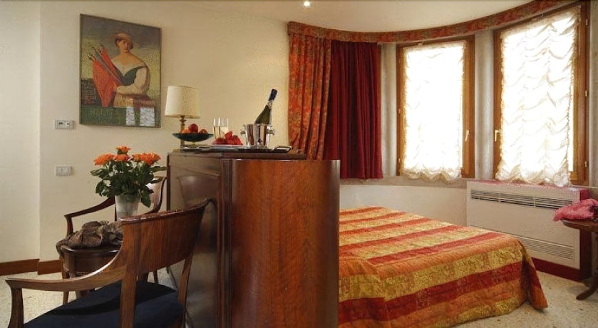 Imagen de la habitación del Hotel Palazzina Fortuny. Foto 8