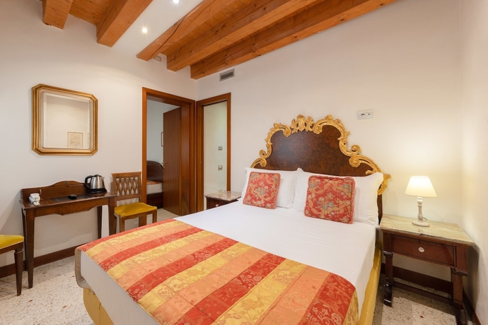 Imagen de la habitación del Hotel Palazzina Fortuny. Foto 9