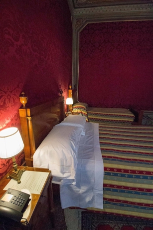 Imagen de la habitación del Hotel Palazzo Abadessa. Foto 10