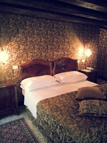 Imagen de la habitación del Hotel Palazzo Abadessa. Foto 13