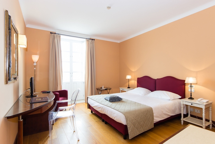 Imagen de la habitación del Hotel Palazzo Artemide. Foto 2