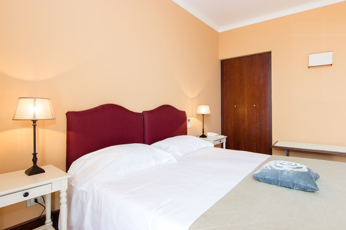 Imagen de la habitación del Hotel Palazzo Artemide. Foto 8