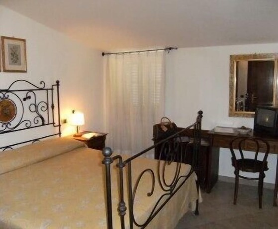 Imagen de la habitación del Hotel Palazzo Brunamonti. Foto 8