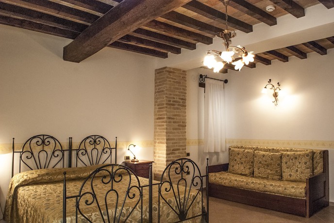 Imagen de la habitación del Hotel Palazzo Brunamonti. Foto 12