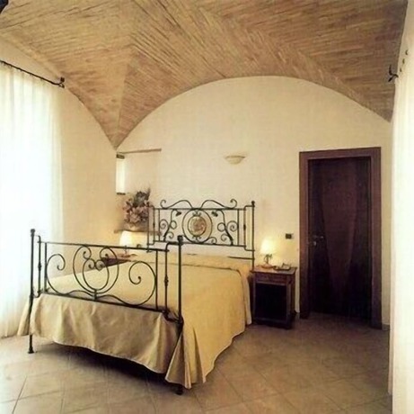 Imagen de la habitación del Hotel Palazzo Brunamonti. Foto 16