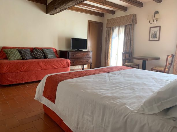 Imagen de la habitación del Hotel Palazzo D&egrave; Rossi. Foto 2