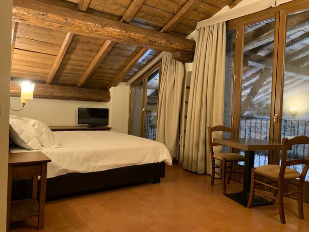 Imagen de la habitación del Hotel Palazzo D&egrave; Rossi. Foto 8