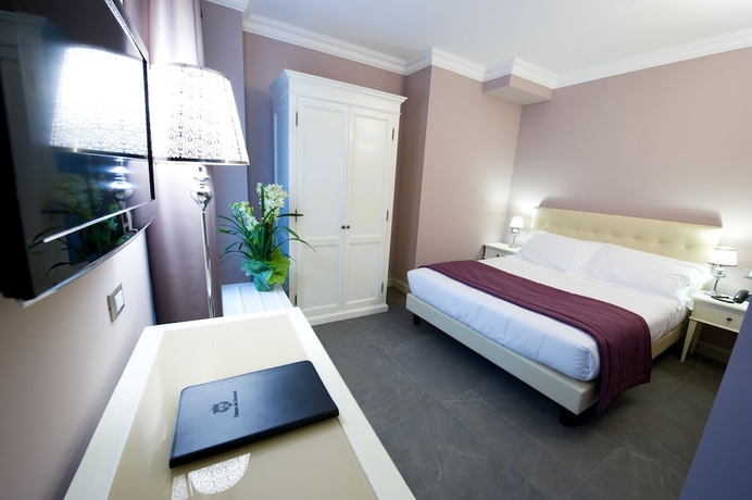 Imagen de la habitación del Hotel Palazzo Dei Mercanti - Historical Residence. Foto 11