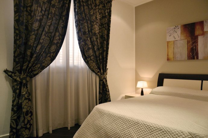 Imagen de la habitación del Hotel Palazzo Ducale Suites. Foto 6