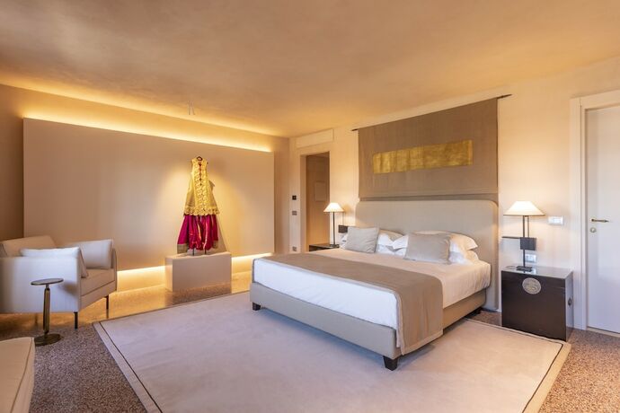 Imagen de la habitación del Hotel Palazzo Durazzo Suites. Foto 11