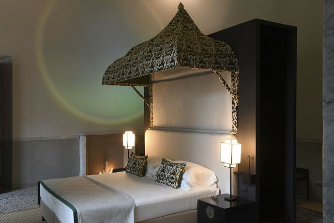 Imagen de la habitación del Hotel Palazzo Durazzo Suites. Foto 13