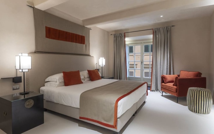 Imagen de la habitación del Hotel Palazzo Durazzo Suites. Foto 15