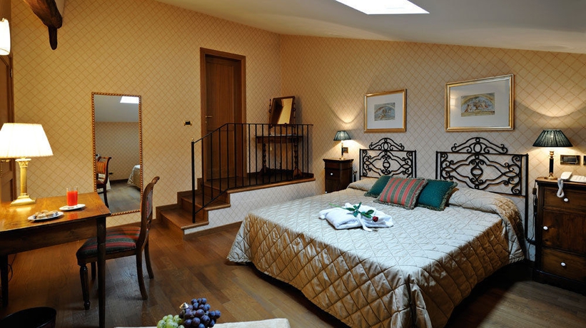 Imagen de la habitación del Hotel Palazzo Failla. Foto 14