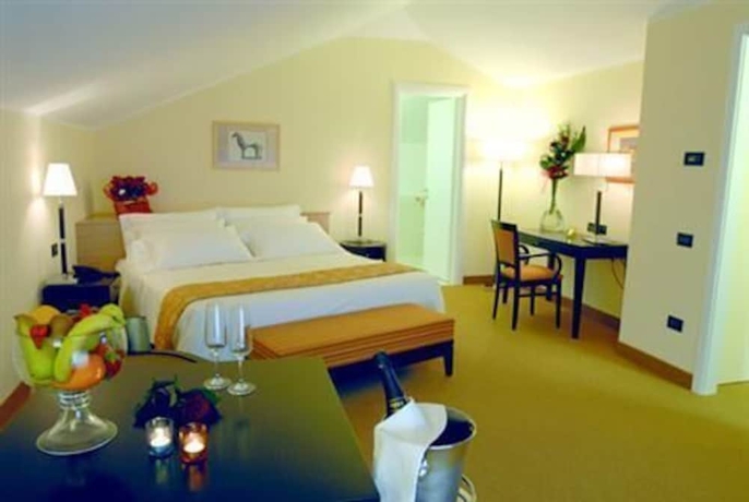 Imagen de la habitación del Hotel Palazzo Foti. Foto 9