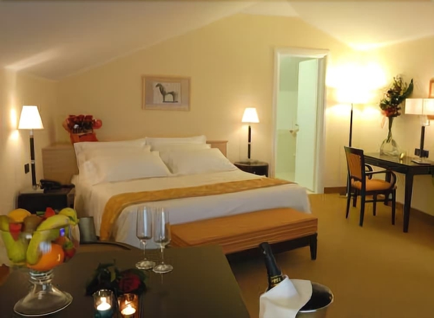 Imagen de la habitación del Hotel Palazzo Foti. Foto 10