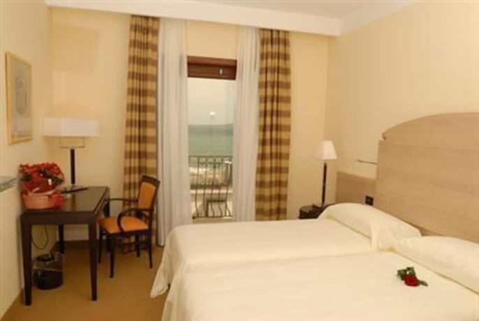 Imagen de la habitación del Hotel Palazzo Foti. Foto 11