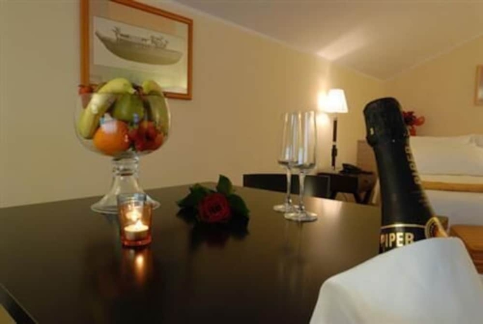 Imagen de la habitación del Hotel Palazzo Foti. Foto 13