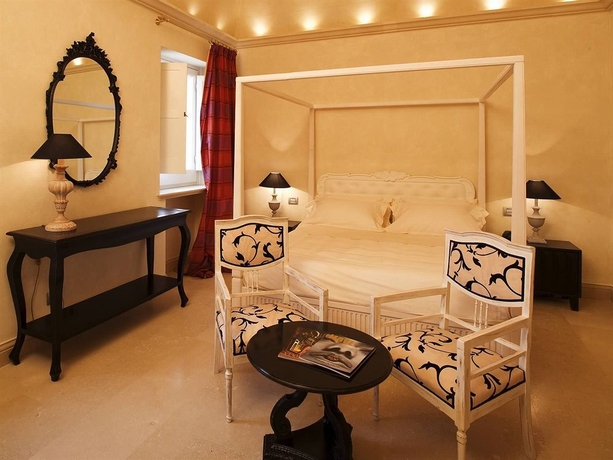 Imagen de la habitación del Hotel Palazzo Gattini Luxury. Foto 3