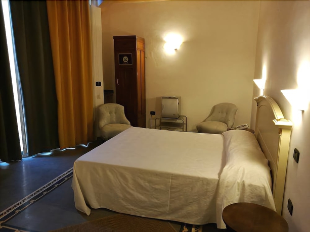 Imagen de la habitación del Hotel Palazzo Giaracà. Foto 3