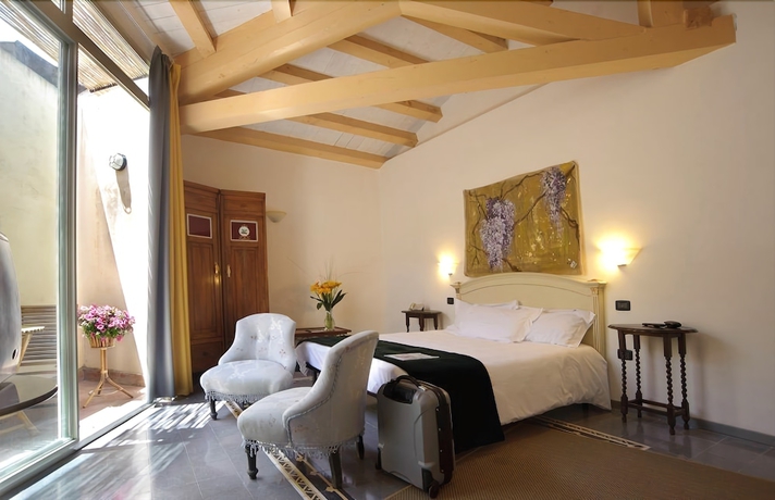 Imagen de la habitación del Hotel Palazzo Giaracà. Foto 11