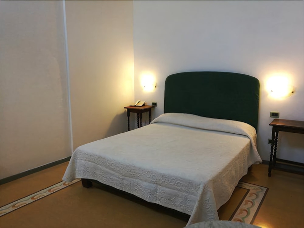 Imagen de la habitación del Hotel Palazzo Giaracà. Foto 16