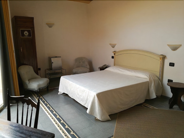 Imagen de la habitación del Hotel Palazzo Giaracà. Foto 17