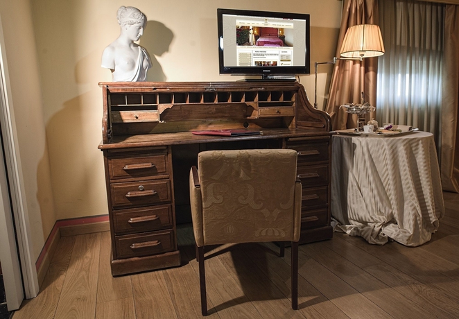 Imagen de la habitación del Hotel Palazzo Guiscardo. Foto 9