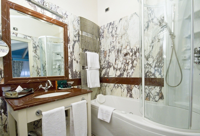 Imagen de la habitación del Hotel Palazzo Guiscardo. Foto 11