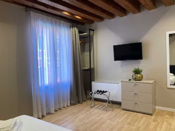 Imagen de la habitación del Hotel Palazzo Martinelli Dolfin. Foto 5