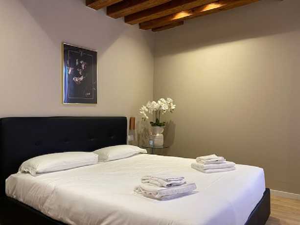 Imagen de la habitación del Hotel Palazzo Martinelli Dolfin. Foto 6