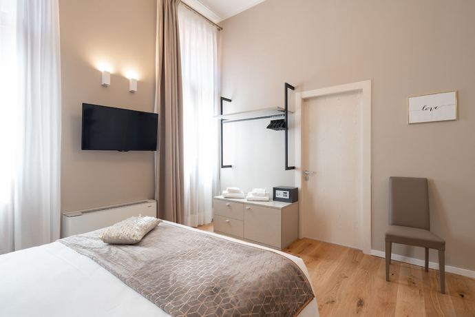 Imagen de la habitación del Hotel Palazzo Martinelli Dolfin. Foto 7