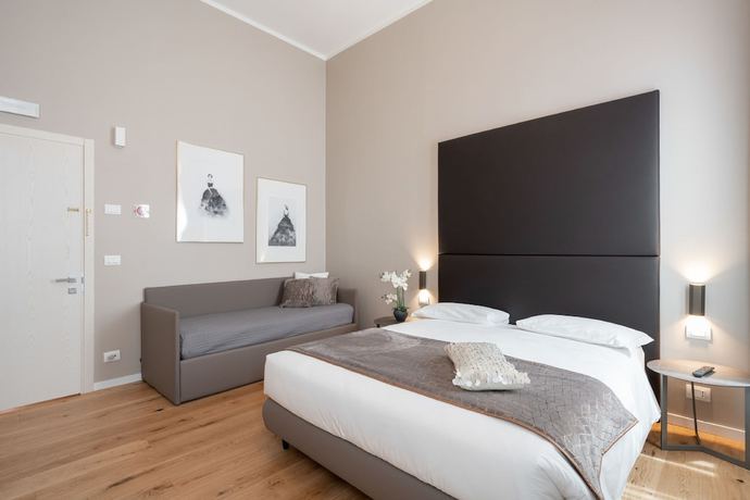 Imagen de la habitación del Hotel Palazzo Martinelli Dolfin. Foto 11