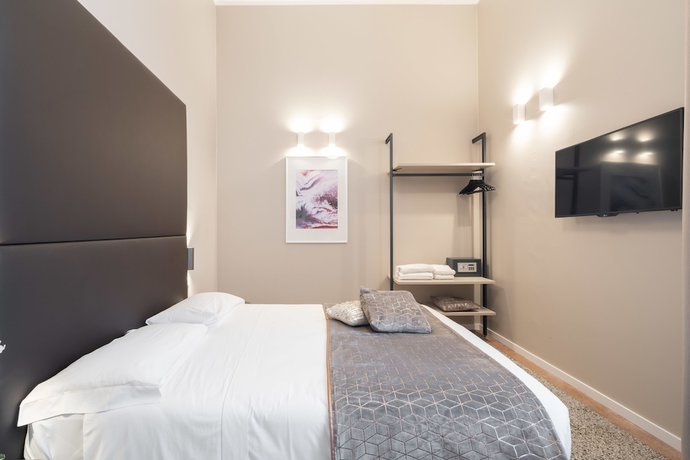 Imagen de la habitación del Hotel Palazzo Martinelli Dolfin. Foto 13