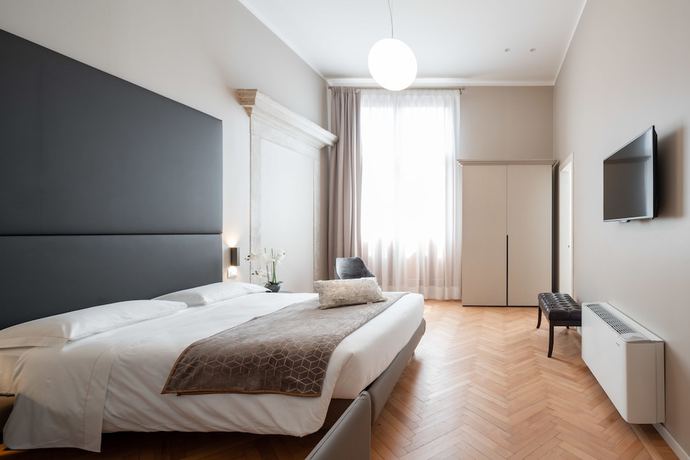 Imagen de la habitación del Hotel Palazzo Martinelli Dolfin. Foto 18