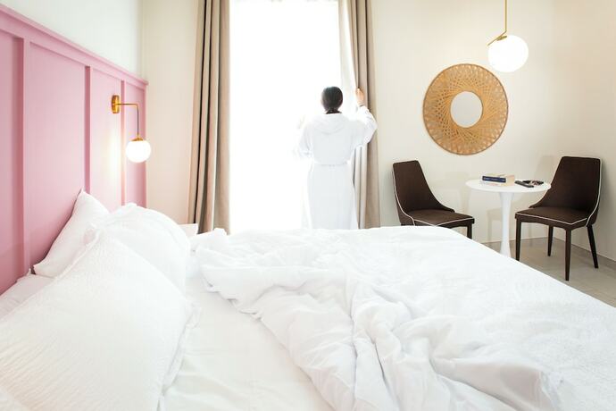 Imagen de la habitación del Hotel Palazzo Matà Boutique. Foto 14