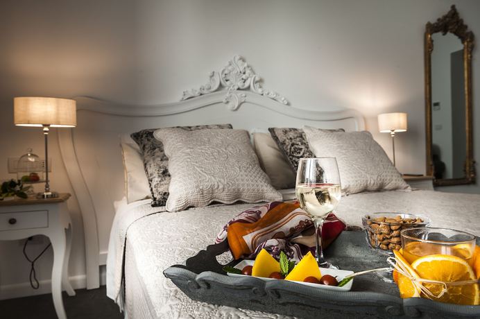 Imagen de la habitación del Hotel Palazzo Natoli Boutique. Foto 4