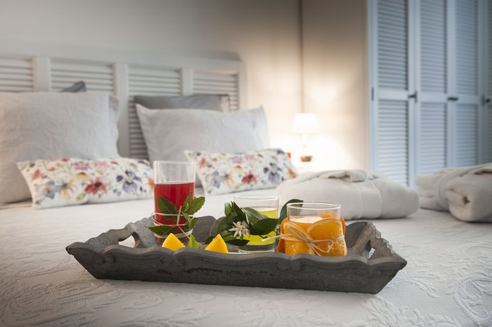 Imagen de la habitación del Hotel Palazzo Natoli Boutique. Foto 10