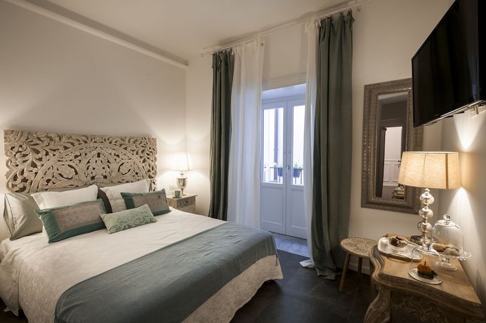 Imagen de la habitación del Hotel Palazzo Natoli Boutique. Foto 12