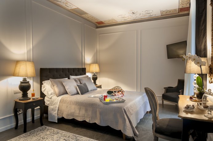 Imagen de la habitación del Hotel Palazzo Natoli Boutique. Foto 14