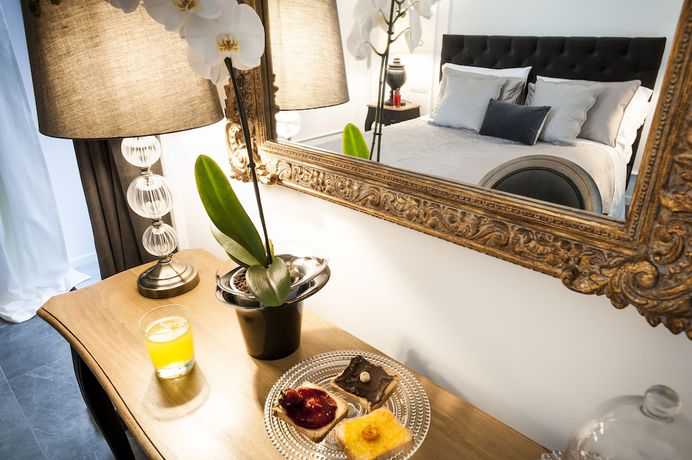 Imagen de la habitación del Hotel Palazzo Natoli Boutique. Foto 18