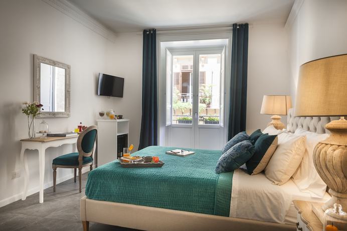 Imagen de la habitación del Hotel Palazzo Natoli Boutique. Foto 19